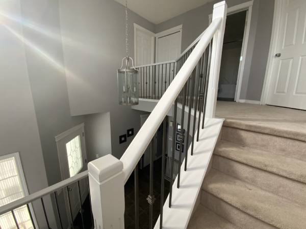 Cougar Ridge painted white banister