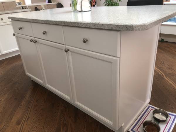 High sheen white painted kitchen island