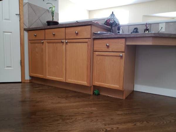 Maple built-in cabinetry before painting Calgary