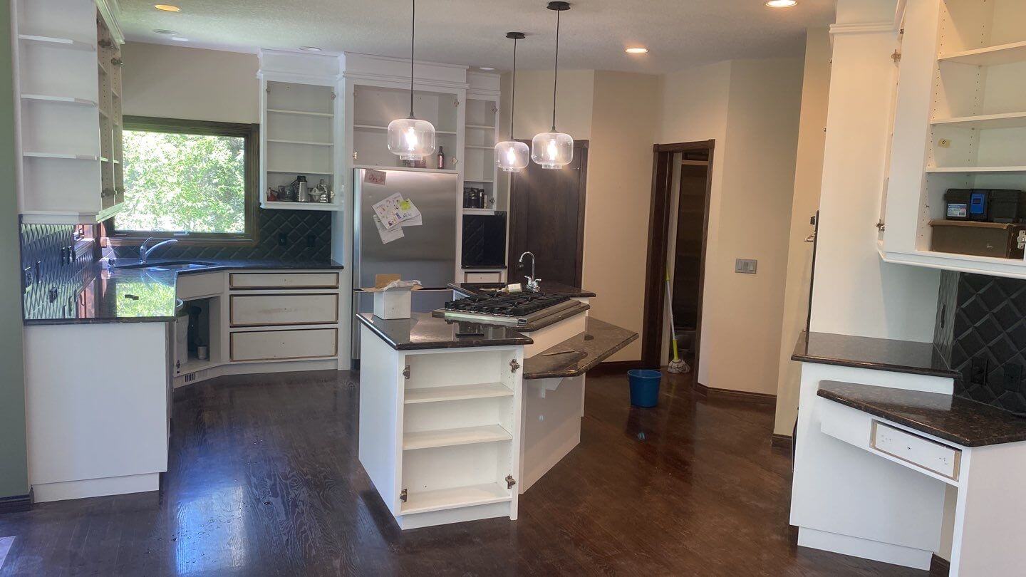 Bragg Creek modern white painted kitchen prior to re-install