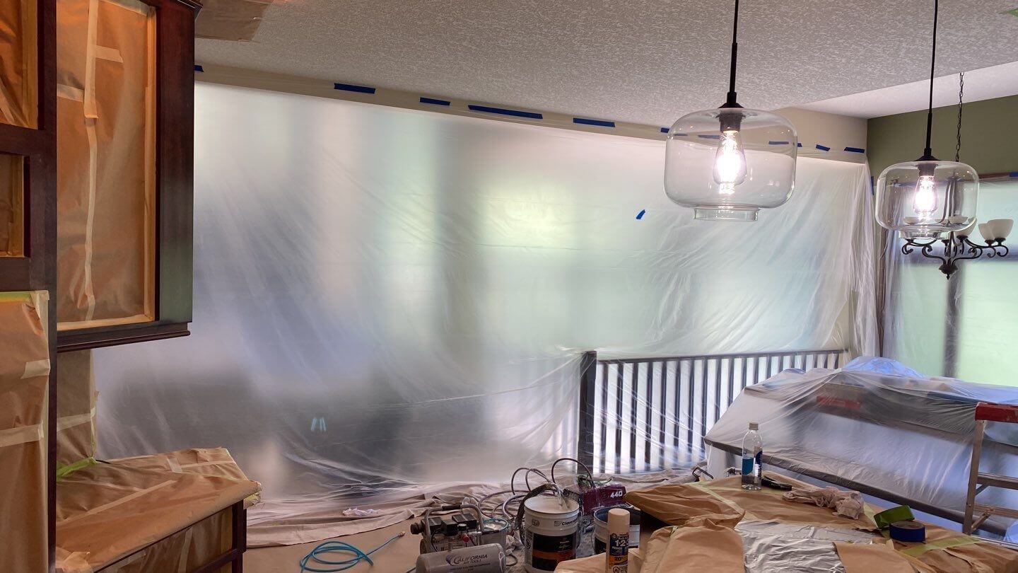 Bragg Creek kitchen poly wall separating spray area from the rest of house