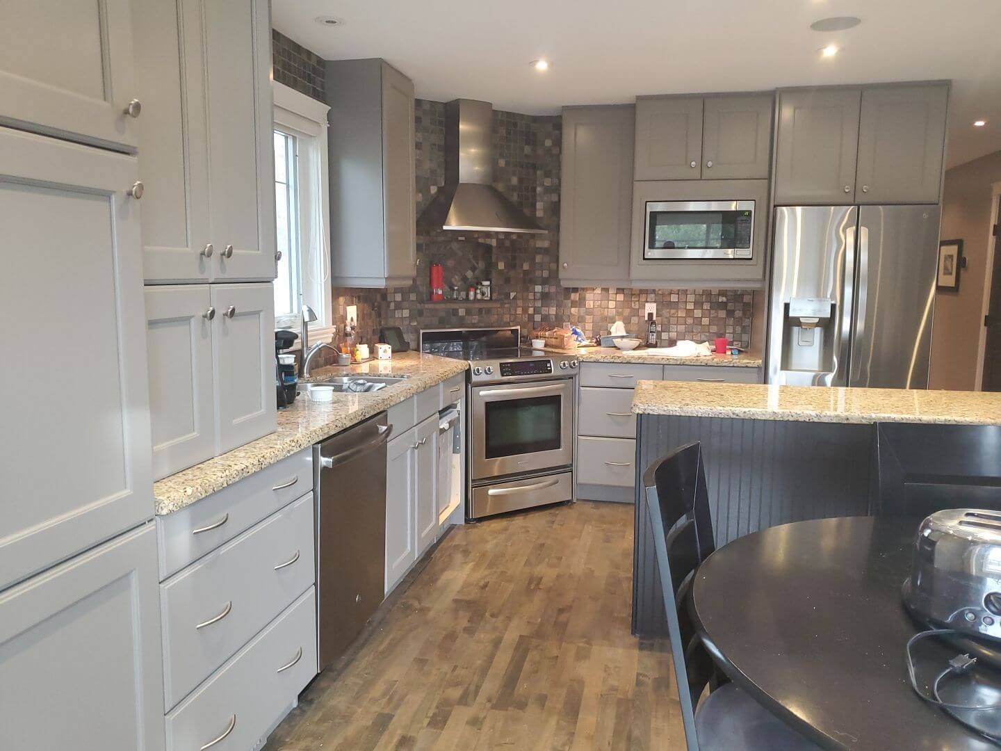 Stylish painted grey kitchen in NE Calgary