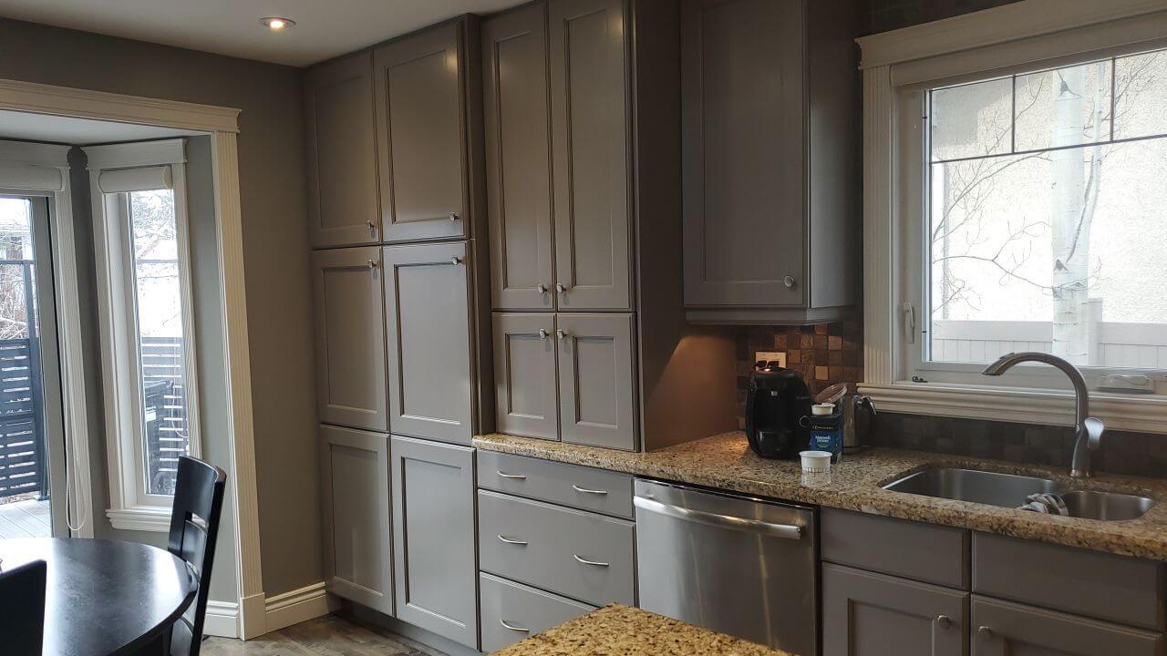 Large painted grey wall cabinets in NE Calgary