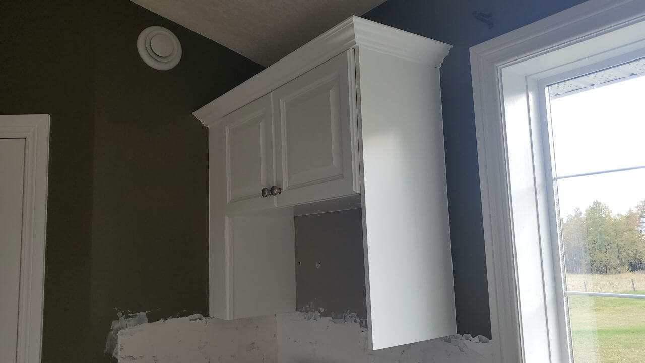 Modern white painted upper cabinets Water Valley