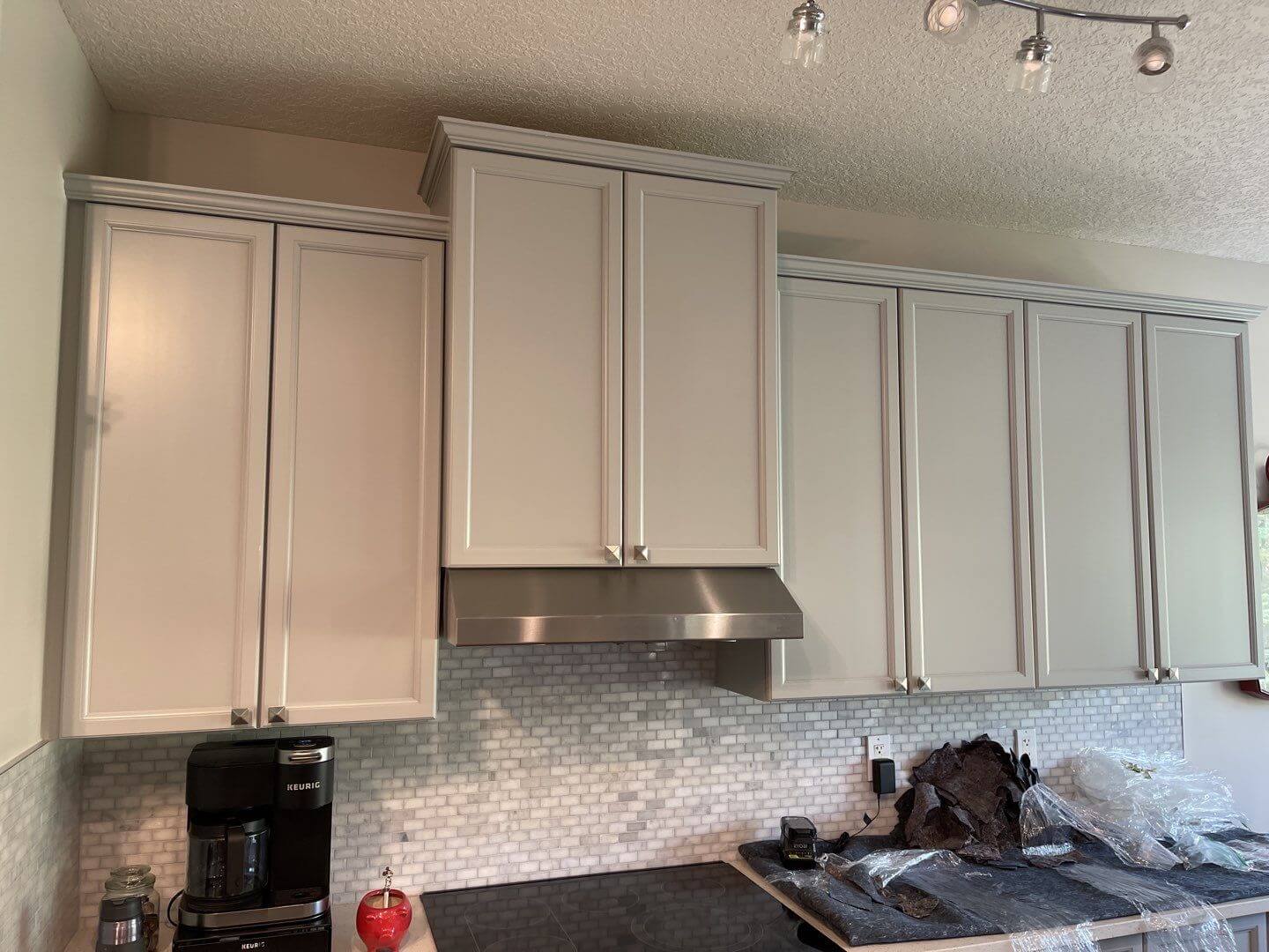 Modern grey painted kitchen cabinetry Okotoks