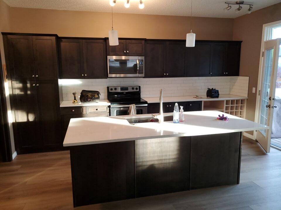 SE Calgary dark stain kitchen before painting