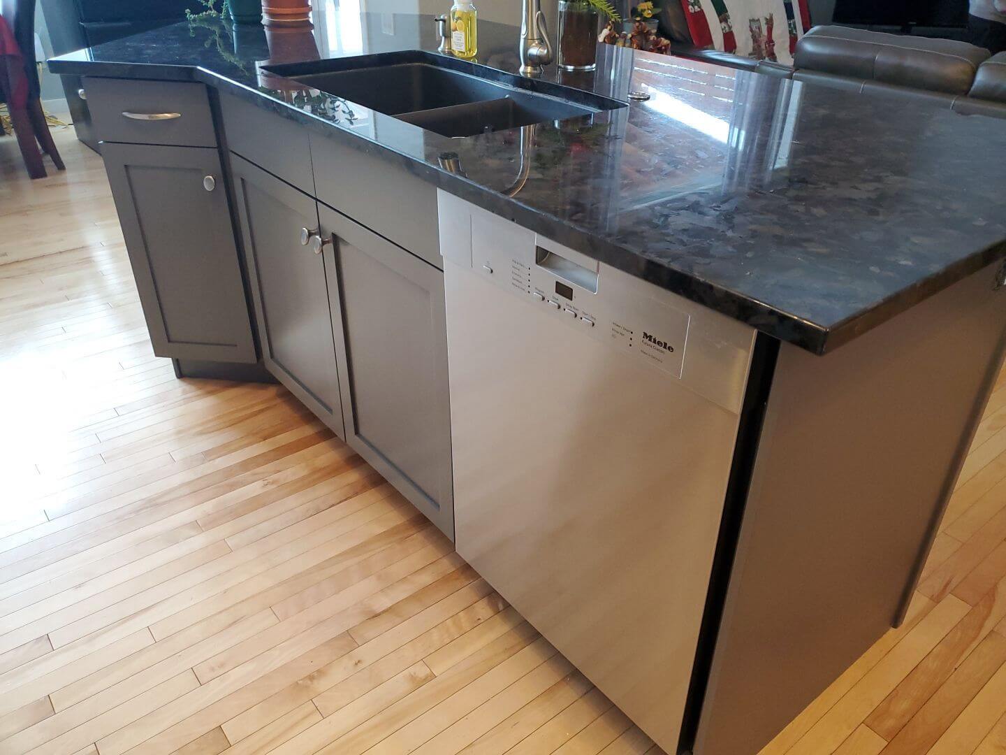 Dark grey painted island and dishwasher panel