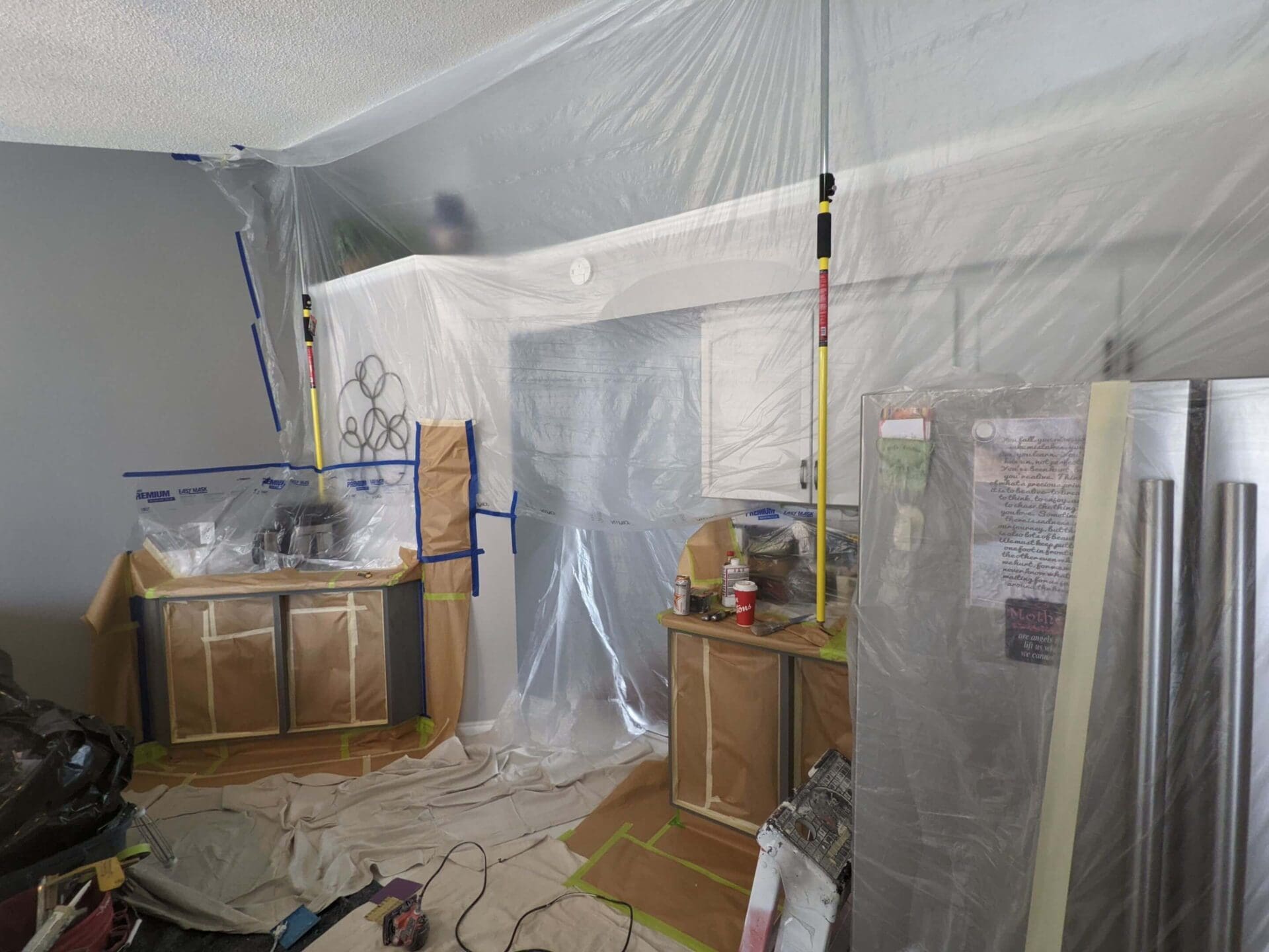 Poly wall separating kitchen from rest of house