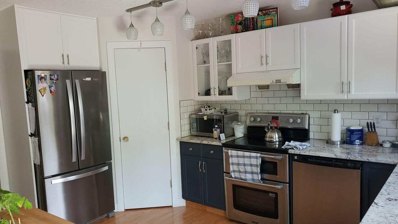 White feature glass cabinet with silver hardware