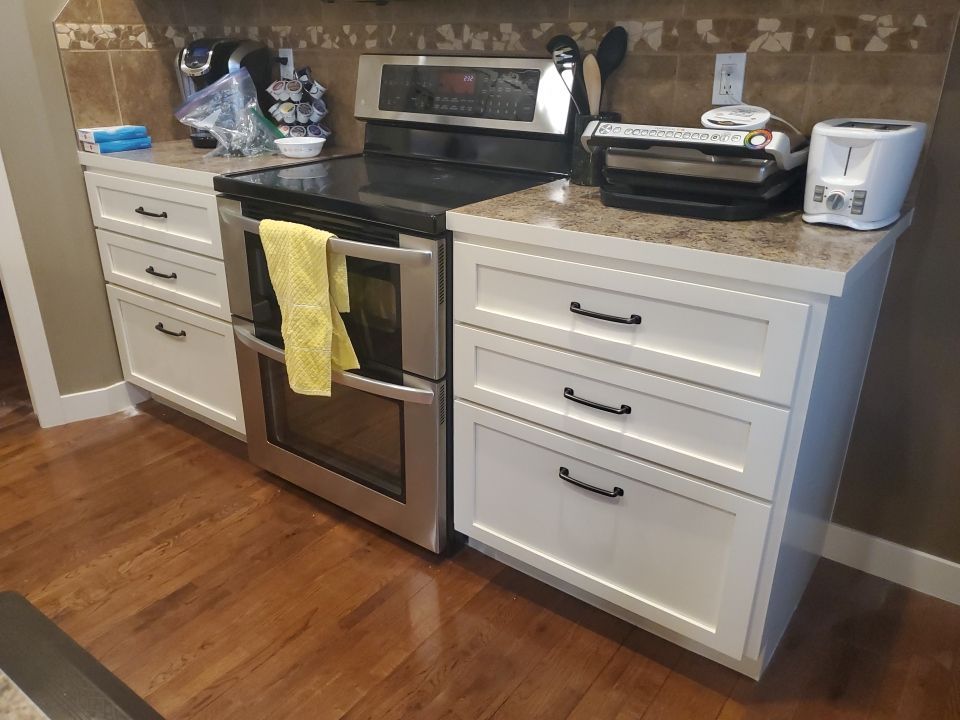 Kitchen lower cabinets painted off white