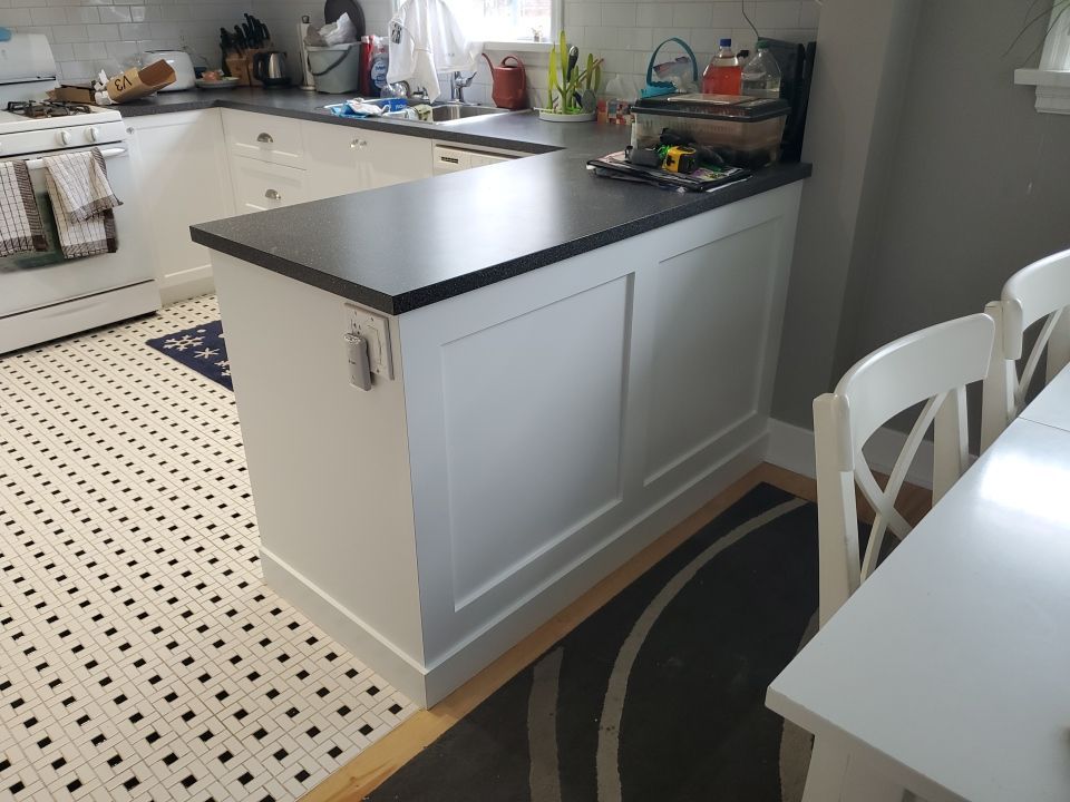 Dated White Cabinets Fixed and Repainted after 3