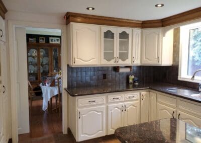 Brown Oak Cabinetry Painted Off-White