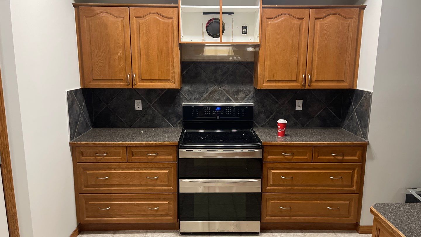 Two tone painted cabinets before 9